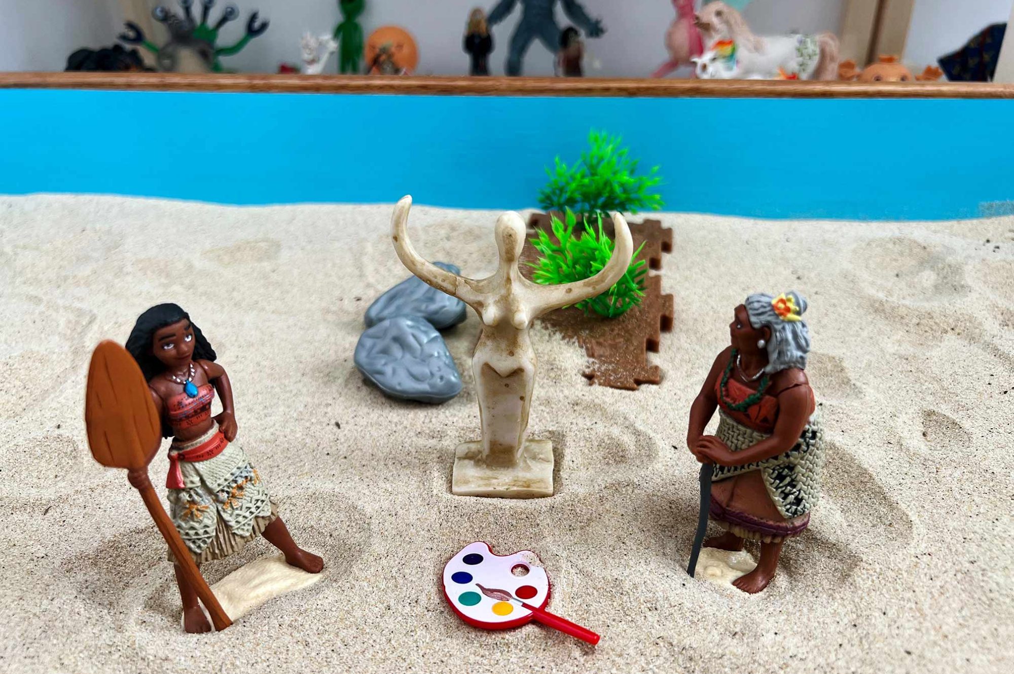 Disney toys in sandpit feat Moana